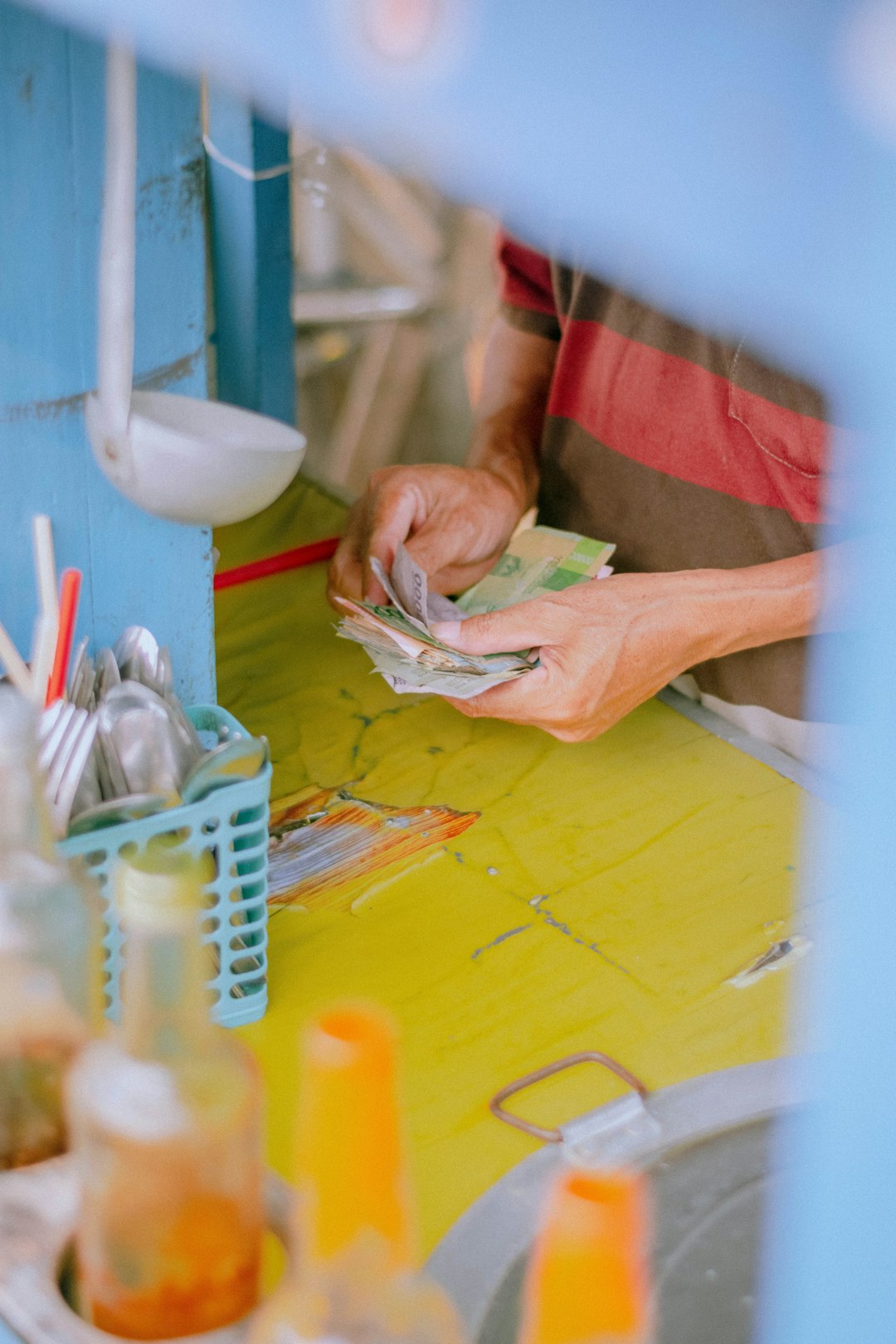 seller counting his money